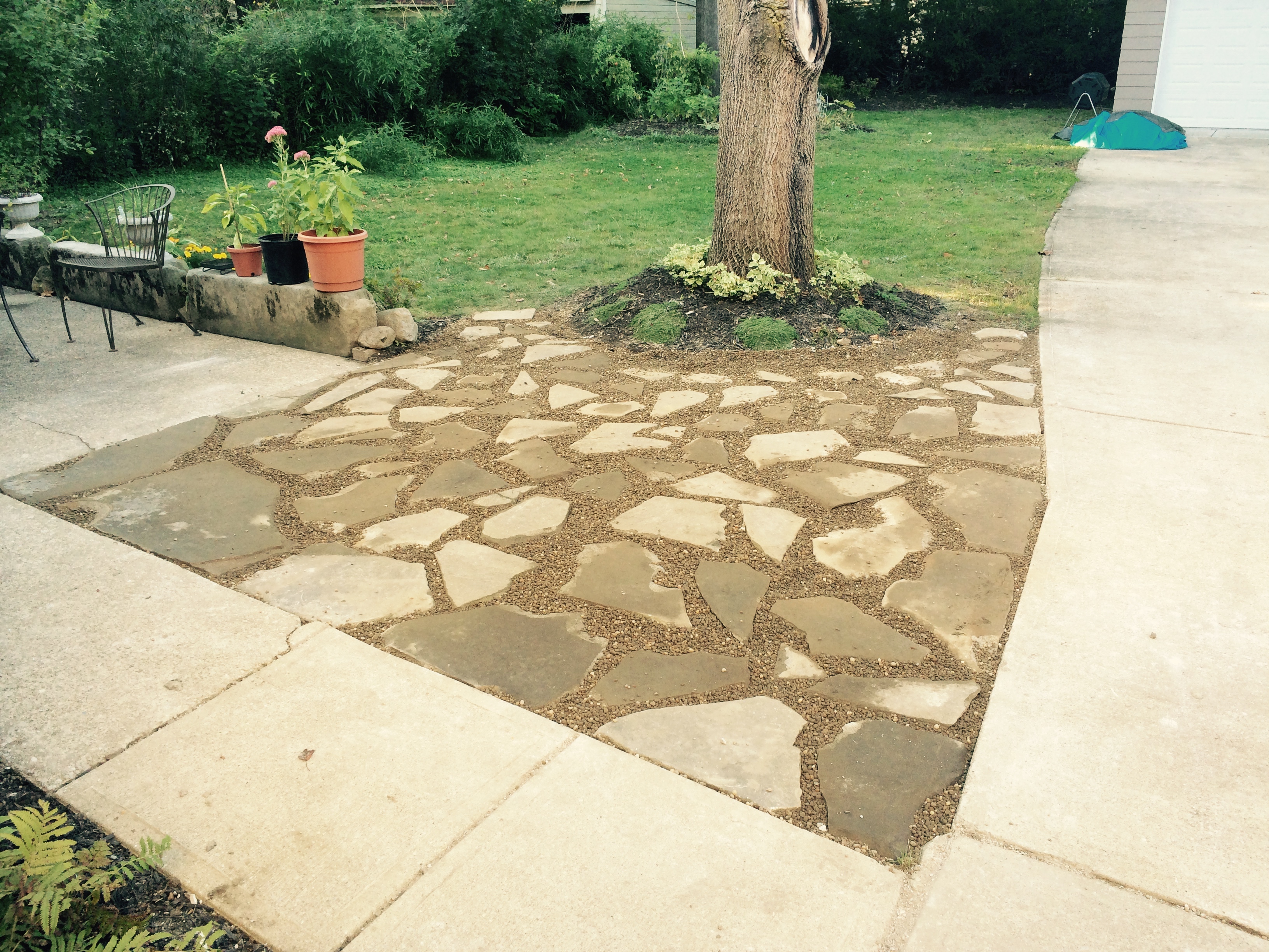 Flagstone Patio Project CLE Landscaping Co., LLC